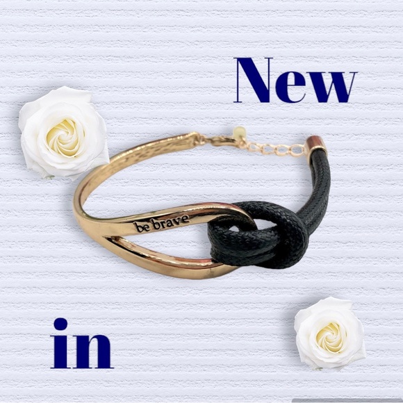 New in package Be Brave Gold Tone And Black
Knot Bracelet - Picture 2 of 6